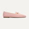 The Double Bit Loafer in Peach Pink shown from the side. 