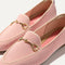 Close up of the bit hardware and vamp of The Double Bit Loafer in Peach Pink. 