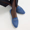 hover | Model wearing The Double Bit Loafer in Blue Bird. 