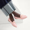 hover | Model wearing The Double Bit Loafer in Peach Pink. 