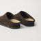 Close up of the heel of The Casual Clog in ReVelvet™ Cheetah, with Rothy's signature blue halo. 