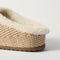 Close up of the heel of The Après Clog in ReVelvet Cream Herringbone.