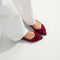 hover | Model wearing The Twist Point Slingback in Cabernet.
