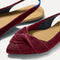 Close up of the toe and twist detail on The Twist Point Slingback in Cabernet.