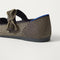 Close up of the heel of The Kids Tux Bow Mary Jane in Bronzite.