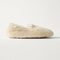 side | The Teddy Slipper in Oat Milk shown from the side.