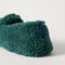 Close up of the heel of The Teddy Slipper in Rosemary.