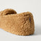 Close up of the heel of The Teddy Slipper in Wren.