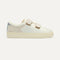 The Kids Strap Sneaker in Vanilla Ice shown from the side. 