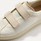 Close up of the vamp of The Kids Strap Sneaker in Vanilla Ice. 