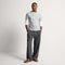 model | Alternate view of a model wearing The Teddy Men's Slipper in Cocoa Spice.