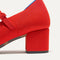 Close up of the heel on The Double Buckle Mary Jane Heel in Bright Red.