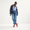 Alternate view of a model wearing The Double Buckle Mary Jane Heel in Bright Red. 