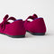Close up of the heel of The Kids Tux Bow Mary Jane in ReVelvet™ Mulberry.