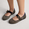hover | Model wearing The Kids Tux Bow Mary Jane in Bronzite.