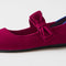 Close up of the bow detail of The Kids Tux Bow Mary Jane in ReVelvet™ Mulberry.