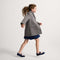 Model | Alternate view of model wearing The Kids Tux Bow Mary Jane in ReVelvet™ Deep Navy.