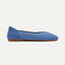 The Daily Flat in Clear Blue shown from the side. 