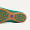 The outsole of The Daily Flat in Clover with raised pegs for extra support. 