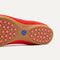 The outsole of The Daily Flat in Showstopper Red with raised pegs for extra support. 