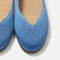 Close up of the toe and vamp of The Daily Flat in Clear Blue. 