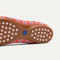 The outsole of The Daily Flat in Sunkiss Stripe with raised pegs for extra support. 