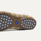 The outsole of The Daily Flat in Terra Stripe with raised pegs for extra support. 