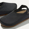 Close up of the rounded topline of The Kids Clog in Black. 