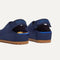 Close up of the heel of The Kids Clog in Deep Navy, with Rothy's signature blue halo. 