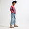 Alternate view of a child wearing The Kids Clog in Dove. 