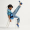 Alternate view of a child wearing The Kids Clog in Indigo Daisy. 