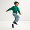 Alternate view of a model wearing The Kids Clog in Deep Navy. 