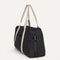 The Travel Duffle in Ink shown in diagonal view. 