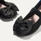 Close up of the bow detail of The Kids Big Bow Mary Jane in Black.