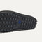 Close up of the supportive peg outsoles of The Men's Daily Driver in Carbon Herringbone. 