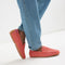 Alternate view of a model wearing The Men's Daily Driver in Cayenne. 