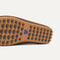 Close up of the supportive peg outsoles of The Men's Daily Driver in Dark Roast. 