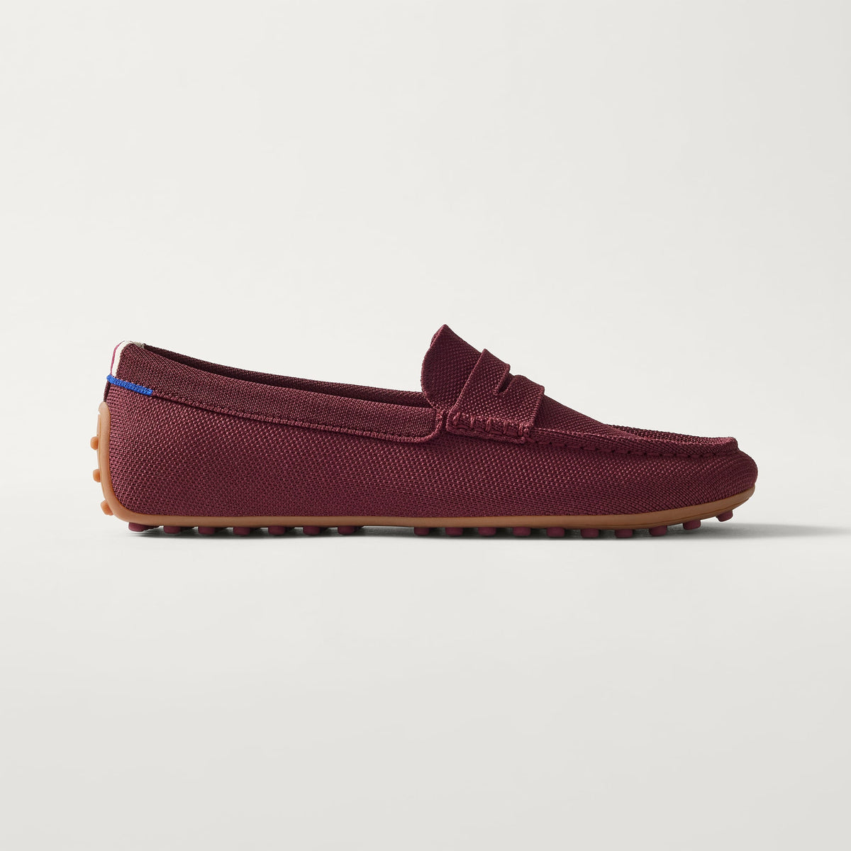side | The Men's Driver in Syrah shown from the side. 