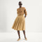 Alternate view of a model wearing The Max Buckle Mary Jane in Tan Woven.