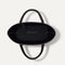 The Two-Way Tote in Sandbar, shown from above, with the reversible interior exposed.