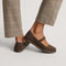 hover | Model wearing The Cruiser Mary Jane in ReVelvet Dark Herringbone.
