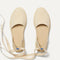 Overlay:: Removable ankle straps! | Alt:: The D'Orsay Espadrille in Seashell shown from the top.