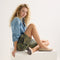 Alternate view of a model wearing The Daily Loafer in Ecru. 