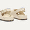 Close up of the heel and adjustable strap of The Weekend Sandal in Coconut.