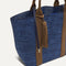 The Lightweight Tote in Dusk Open-Knit shown with its handy key leash. 
