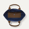 The Lightweight Tote in Dusk Open-Knit shown open from the top, with interior visible. 