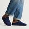hover | Model wearing The Men's Clog in ReVelvet™ Deep Navy.