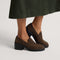 hover | Model wearing The Block Heel Loafer in ReVelvet Dark Herringbone. 