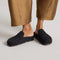 hover | Model wearing The Penny Clog in Soft Black.
