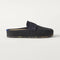 side | The Penny Clog in Soft Black shown from the side.